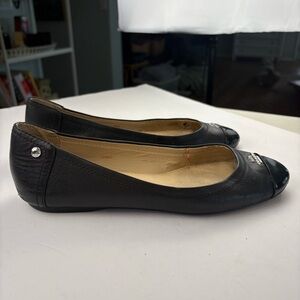 Coach Black Leather Women's Flats with Silver Accents